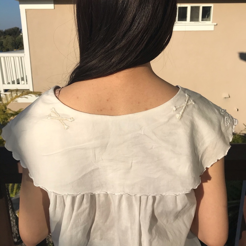 Dreamy flowy Women’s blouse baby doll with detail